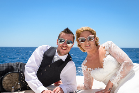 bride and groom on a boat